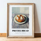 Pretzel Bread – on Striped Tablecloth, German Pastry Still Life, in wooden frame leaning on the floor