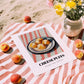 Cheese Puffs – on Striped Tablecloth, American Cheese Painting, unframed on coastal sand