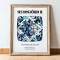 Seyðisfjörður, Iceland – Travel Poster, in wooden frame leaning on the floor